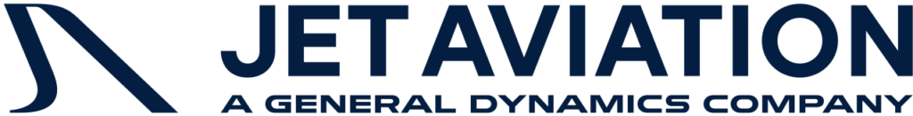 Business Aviation Group Jet Aviation logo featuring stylized initials and the text “Jet Aviation, A General Dynamics Company” in bold, dark blue letters on a light background, representing their presence at Rocky Mountain Metropolitan Airport (BJC).