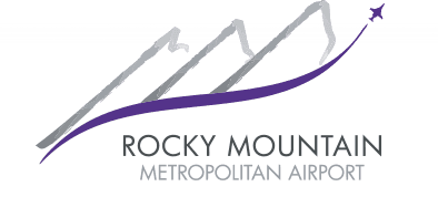 Business Aviation Group Logo for Rocky Mountain Metropolitan Airport (BJC) featuring stylized gray mountain outlines, a purple swoosh, and a small purple airplane above the airport's name in gray text.